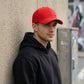 Classic Red Baseball Cap with Minimal Badge
